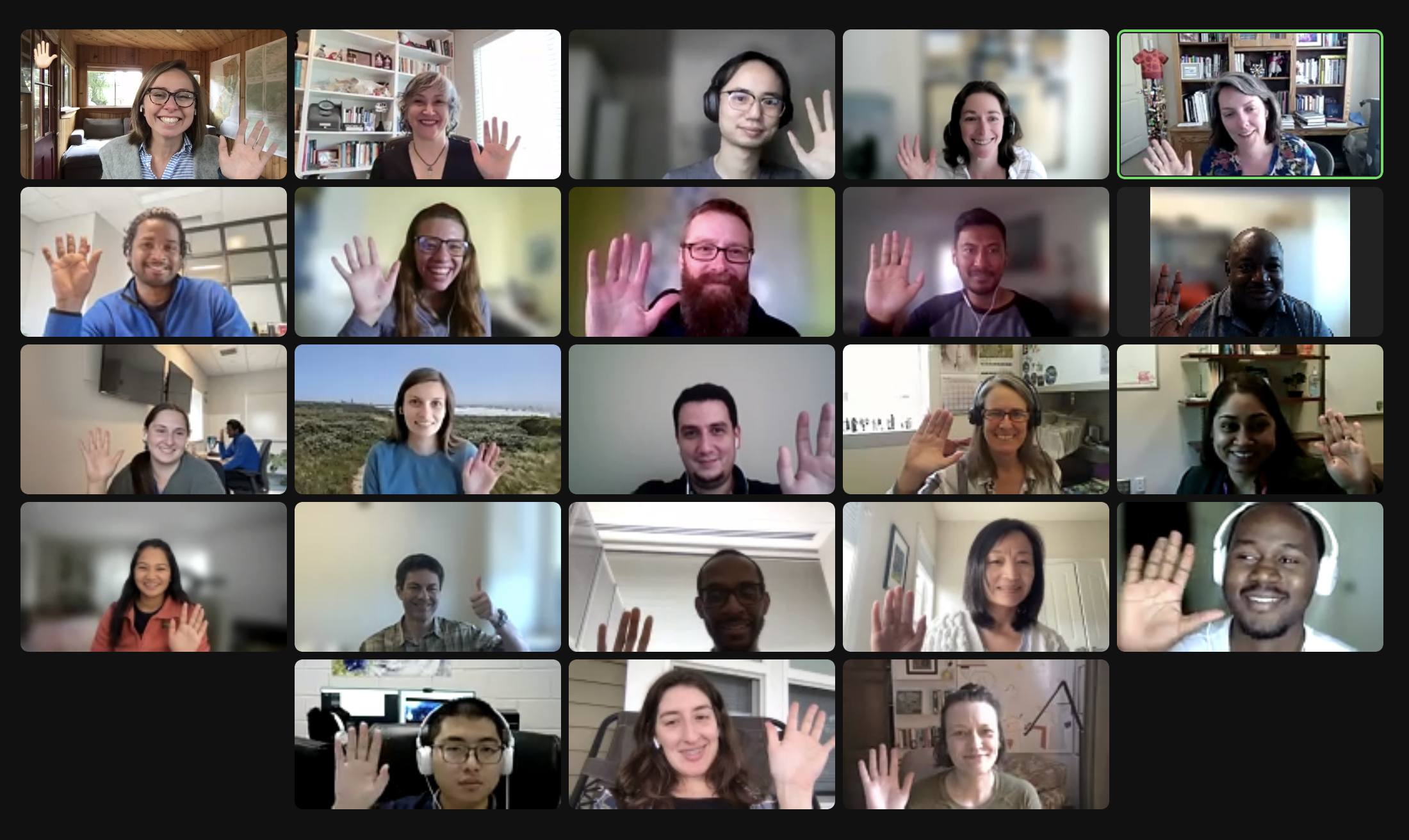screenshot of 23 zoom participant faces smiling and waving
